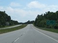 Mileage sign on Interstate 185 South. It's 2 1/2 miles to the junction of SC 20, 13 miles to the junction of Interstate 385 (which is the southern/eastern terminus of I-185), and 104 miles to Columbia. (Photo taken 5/27/17).